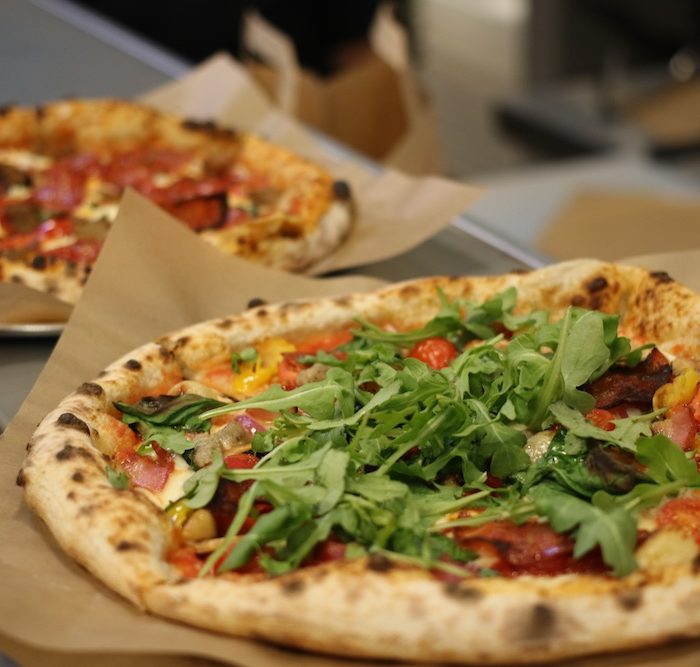 pi co pizza arugula tomatos