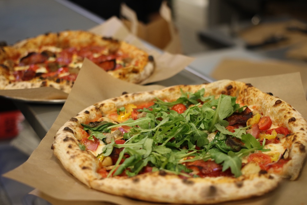 pi co pizza arugula tomatos